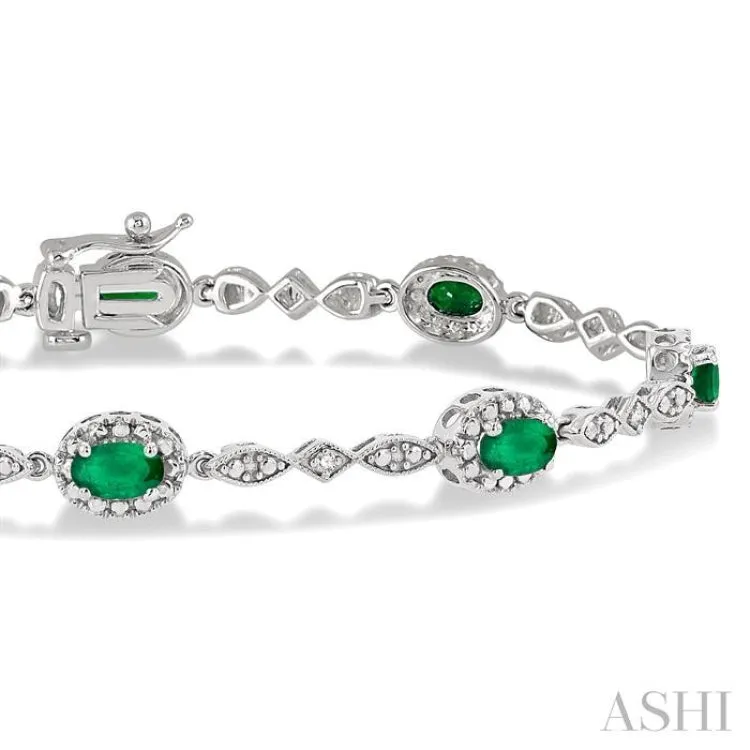 5x3 MM Oval Cut Emerald and 1/20 Ctw Single Cut Diamond Bracelet in 10K White Gold